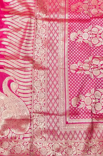 Rani pink zari woven silk blend traditional saree with blouse piece