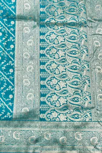 Blue zari woven silk blend traditional saree with blouse piece