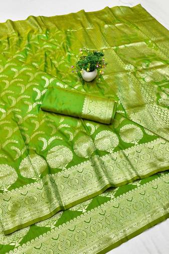 Green zari woven silk blend traditional saree with blouse piece