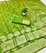 Green zari woven banarasi silk blend traditional saree with blouse piece