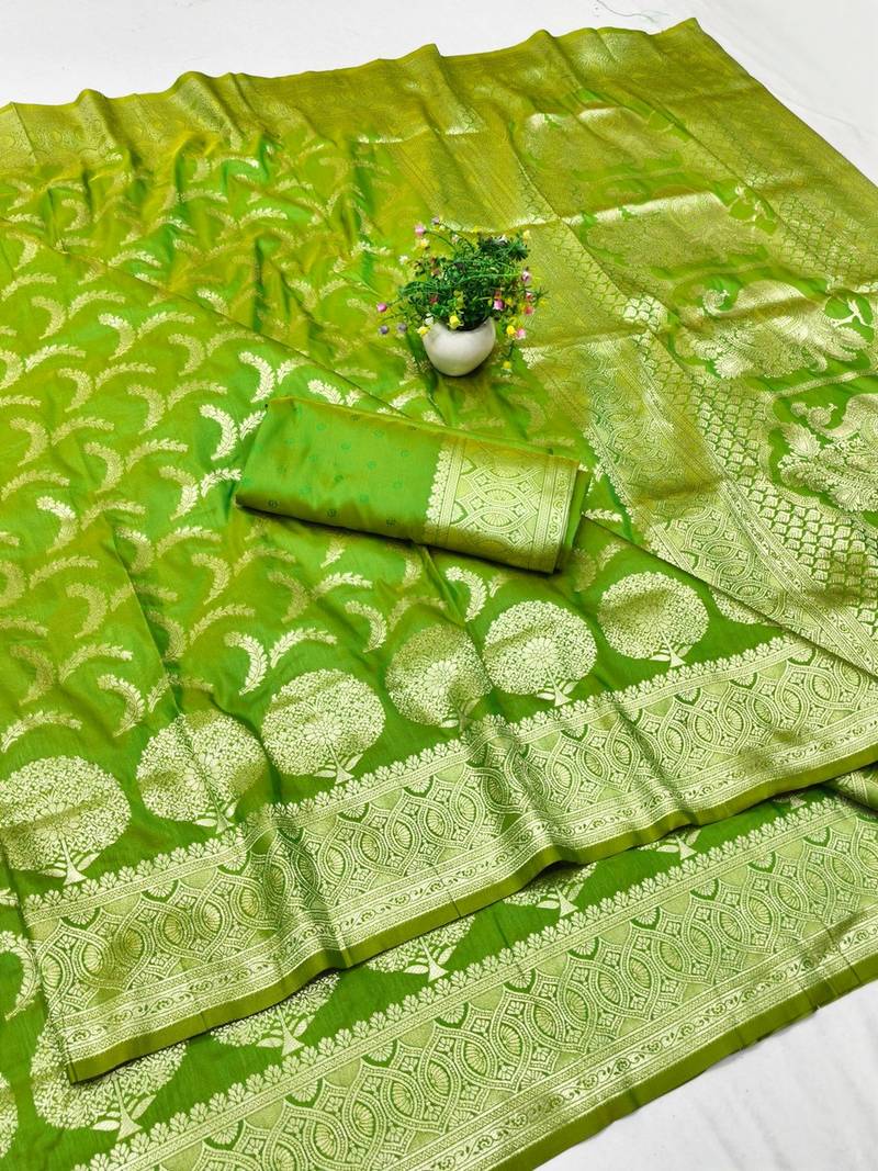 Green zari woven banarasi silk blend traditional saree with blouse piece