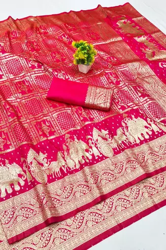 Rani zari woven banarasi silk blend traditional saree with blouse piece