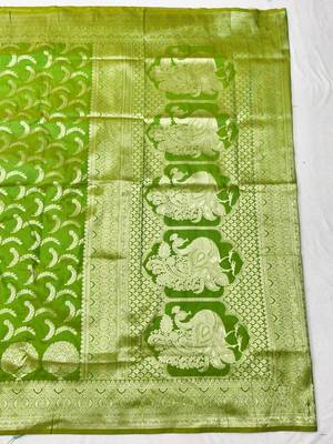 Green zari woven silk blend traditional saree with blouse piece 2