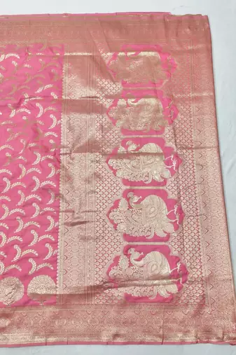 Pink zari woven silk blend traditional saree with blouse piece