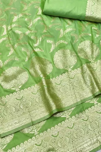 Light green zari woven silk blend traditional saree with blouse piece