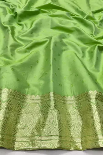 Light green zari woven silk blend traditional saree with blouse piece