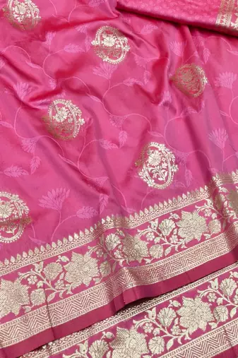 Pink zari woven silk blend traditional saree with blouse piece
