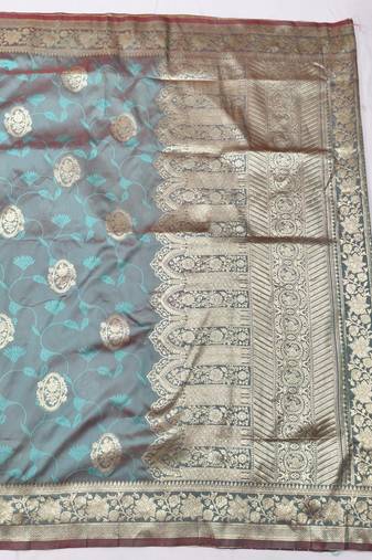 Light blue zari woven banarasi silk blend traditional saree with blouse piece