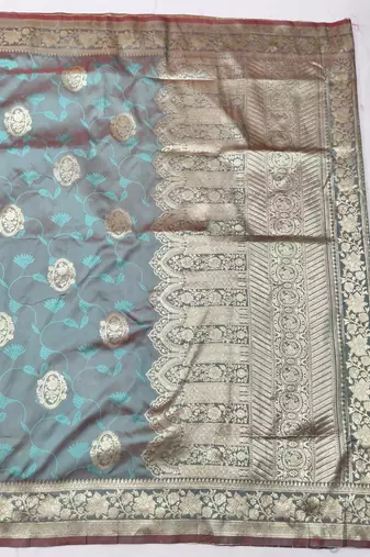 Light blue zari woven banarasi silk blend traditional saree with blouse piece
