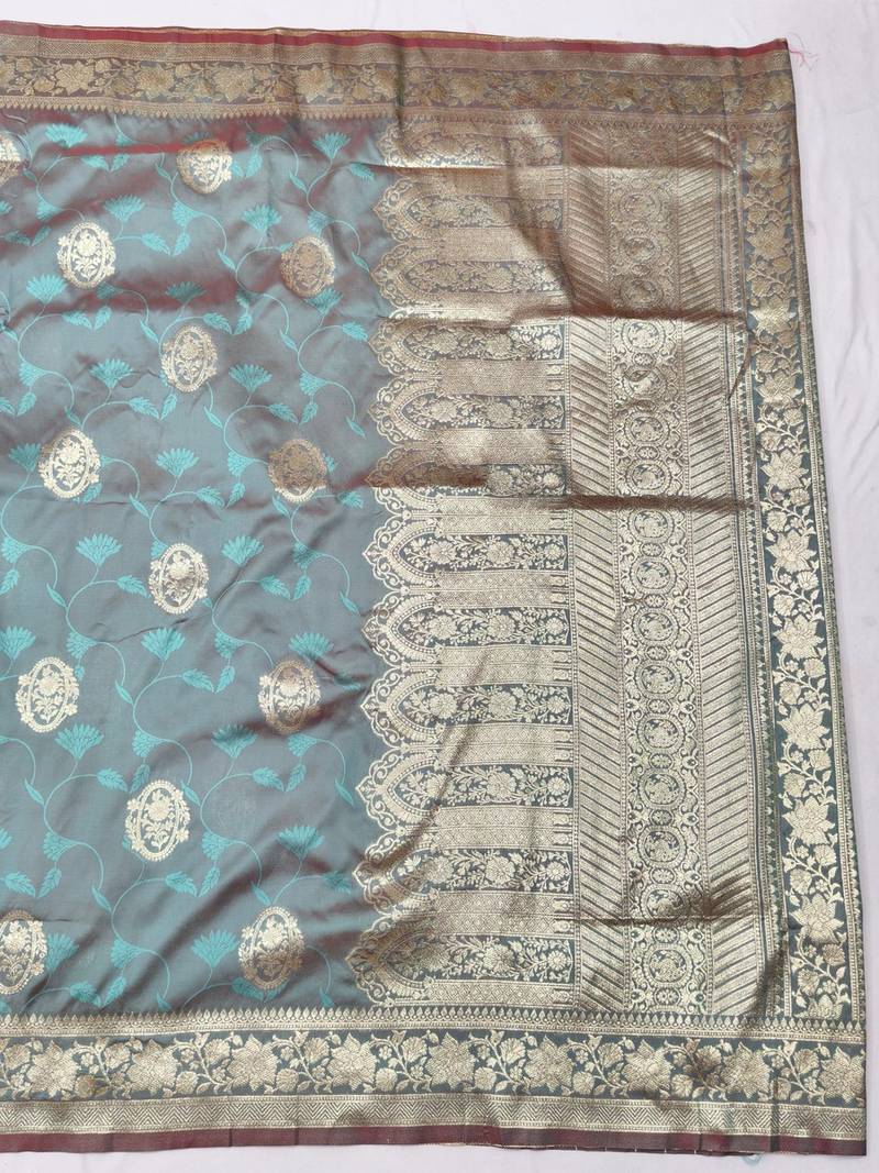 Light blue zari woven banarasi silk blend traditional saree with blouse piece