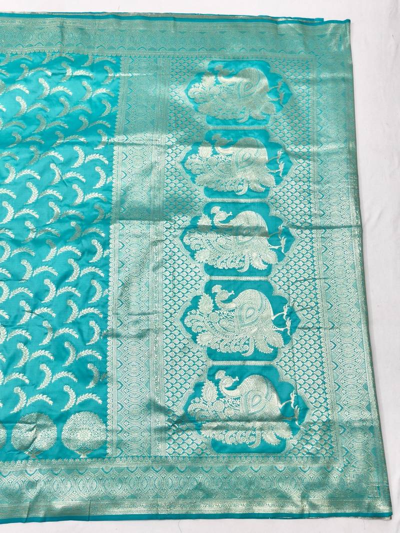 Blue zari woven banarasi silk blend traditional saree with blouse piece