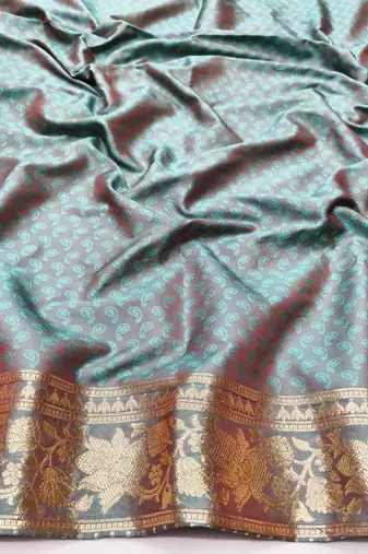 Light blue zari woven silk blend traditional saree with blouse piece
