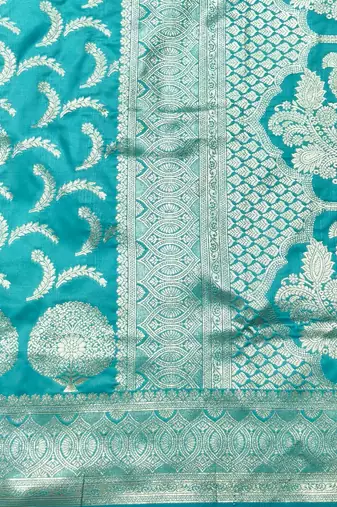 Blue zari woven silk blend traditional saree with blouse piece
