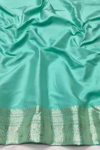Light blue zari woven banarasi silk blend traditional saree with blouse piece