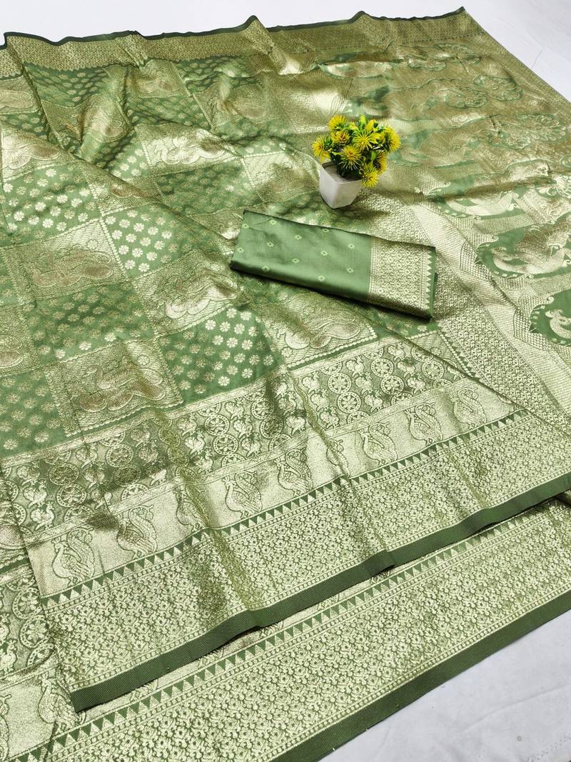 Pista zari woven banarasi silk blend traditional saree with blouse piece