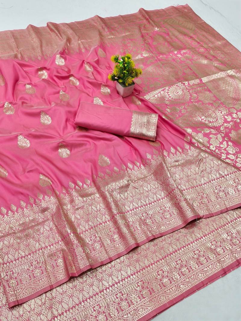 Pink zari woven banarasi silk blend traditional saree with blouse piece