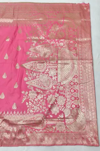 Pink zari woven silk blend traditional saree with blouse piece
