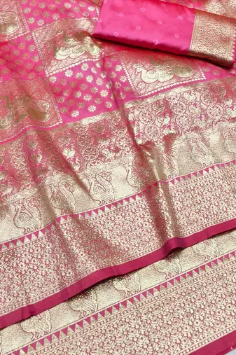 Pink zari woven silk blend traditional saree with blouse piece