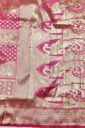 Pink zari woven silk blend traditional saree with blouse piece