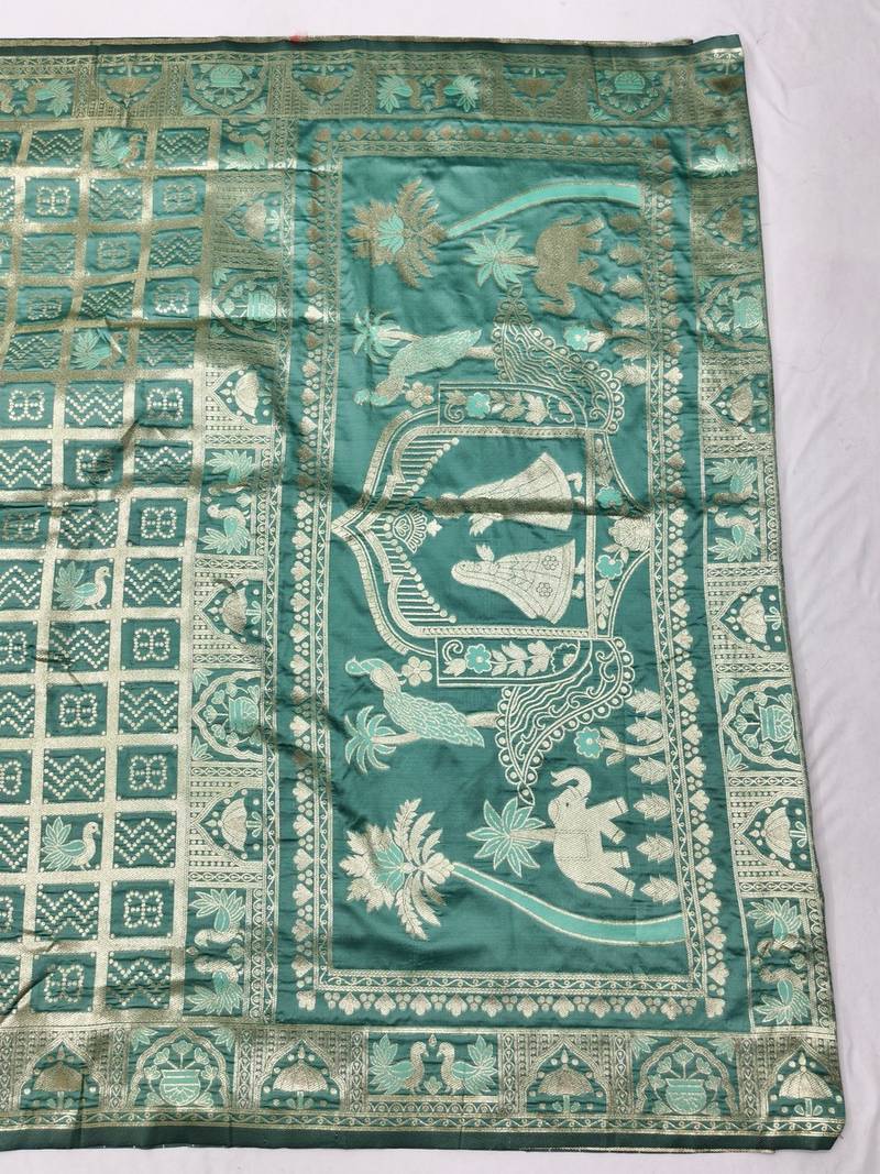 Green zari woven patola silk blend traditional saree with blouse piece