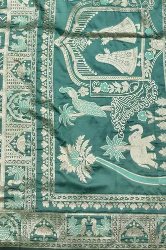 Green zari woven patola silk blend traditional saree with blouse piece
