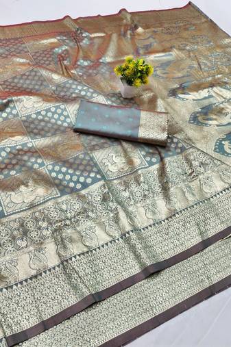 Light blue zari woven silk blend traditional saree with blouse piece