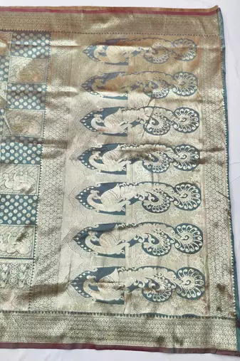 Light blue zari woven silk blend traditional saree with blouse piece