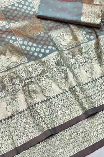 Light blue zari woven silk blend traditional saree with blouse piece