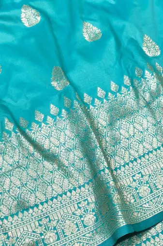 Blue pink zari woven silk blend traditional saree with blouse piece