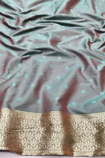 Light blue zari woven silk blend traditional saree with blouse piece