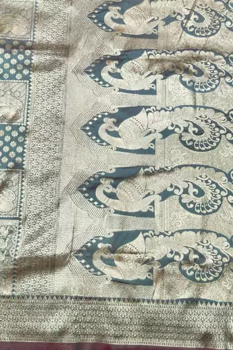 Light blue zari woven silk blend traditional saree with blouse piece