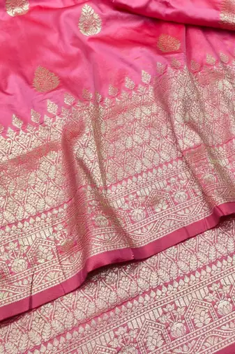 Pink zari woven silk blend traditional saree with blouse piece