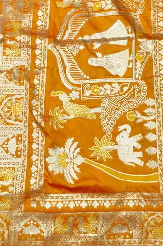 Mustard zari woven patola silk blend traditional saree with blouse piece