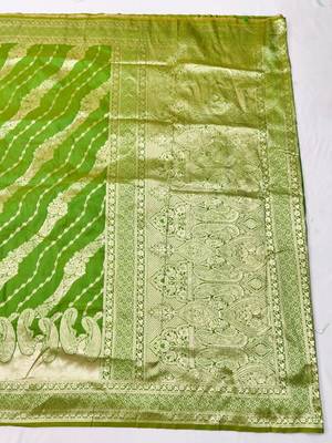 Green zari woven silk blend traditional saree with blouse piece 1