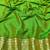 Green zari woven silk blend traditional saree with blouse piece