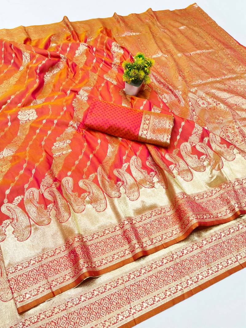 Pink zari woven silk blend traditional saree with blouse piece