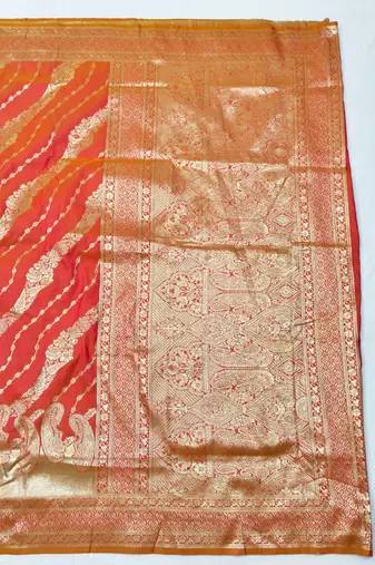 Pink zari woven silk blend traditional saree with blouse piece