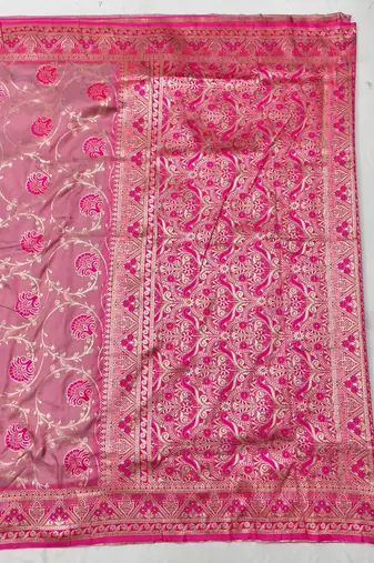 Pink zari woven silk blend traditional saree with blouse piece