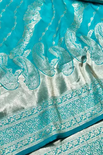 Blue zari woven silk blend traditional saree with blouse piece