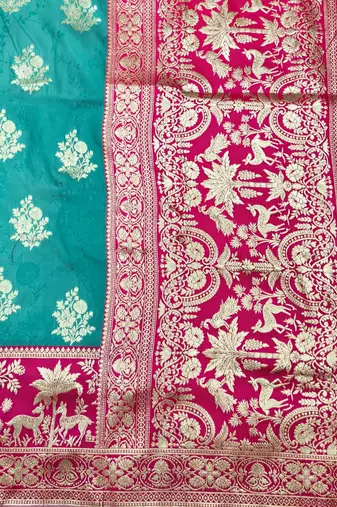 Blue zari woven silk blend traditional saree with blouse piece