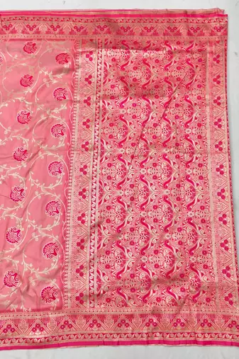 Pink zari woven silk blend traditional saree with blouse piece