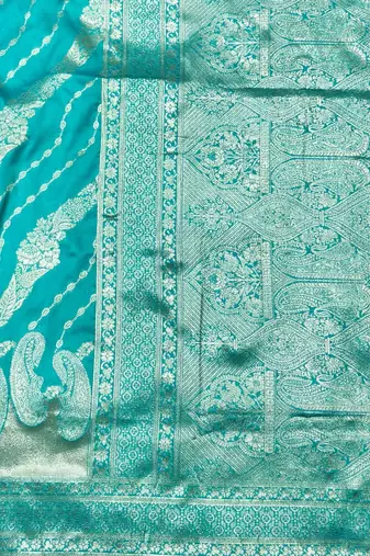 Blue zari woven silk blend traditional saree with blouse piece
