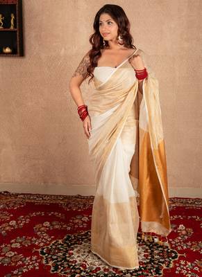 white linen saree with golden border 1