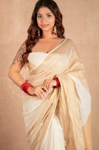 white linen saree with golden border