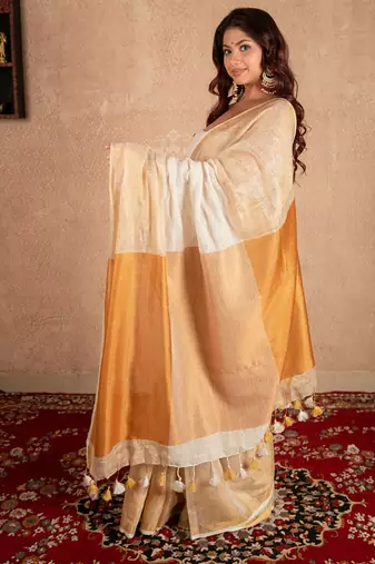 white linen saree with golden border