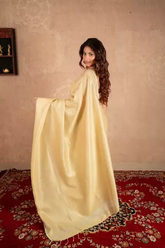 cream linen saree with golden pallu