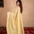 cream linen saree with golden pallu