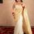 cream linen saree with golden pallu