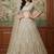 Beige Net Embroidered Lehengas