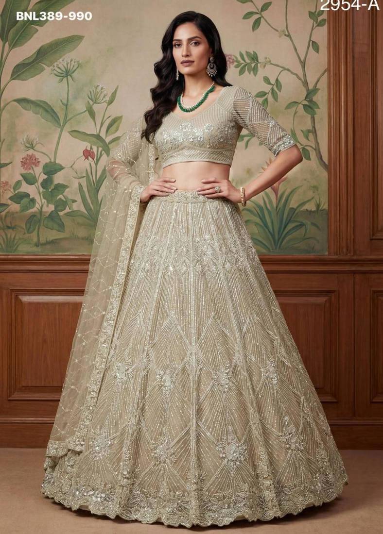 Beige Net Embroidered Lehengas